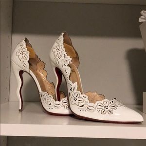 Louboutin crooked heal with red bottom